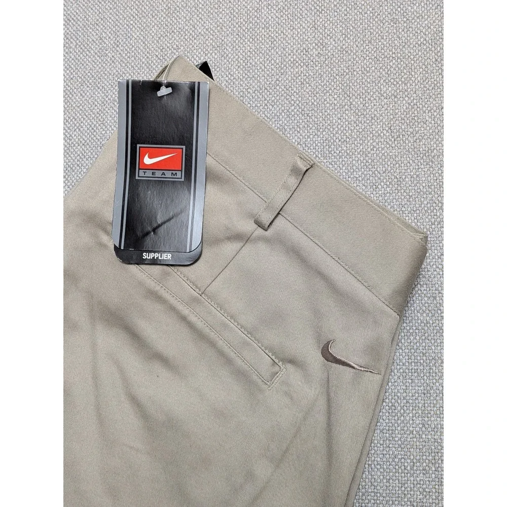 Nike Team Men's Will Chino Pants Tan 36 Cotton Spandex Pleated Unhemmed Golf NWT